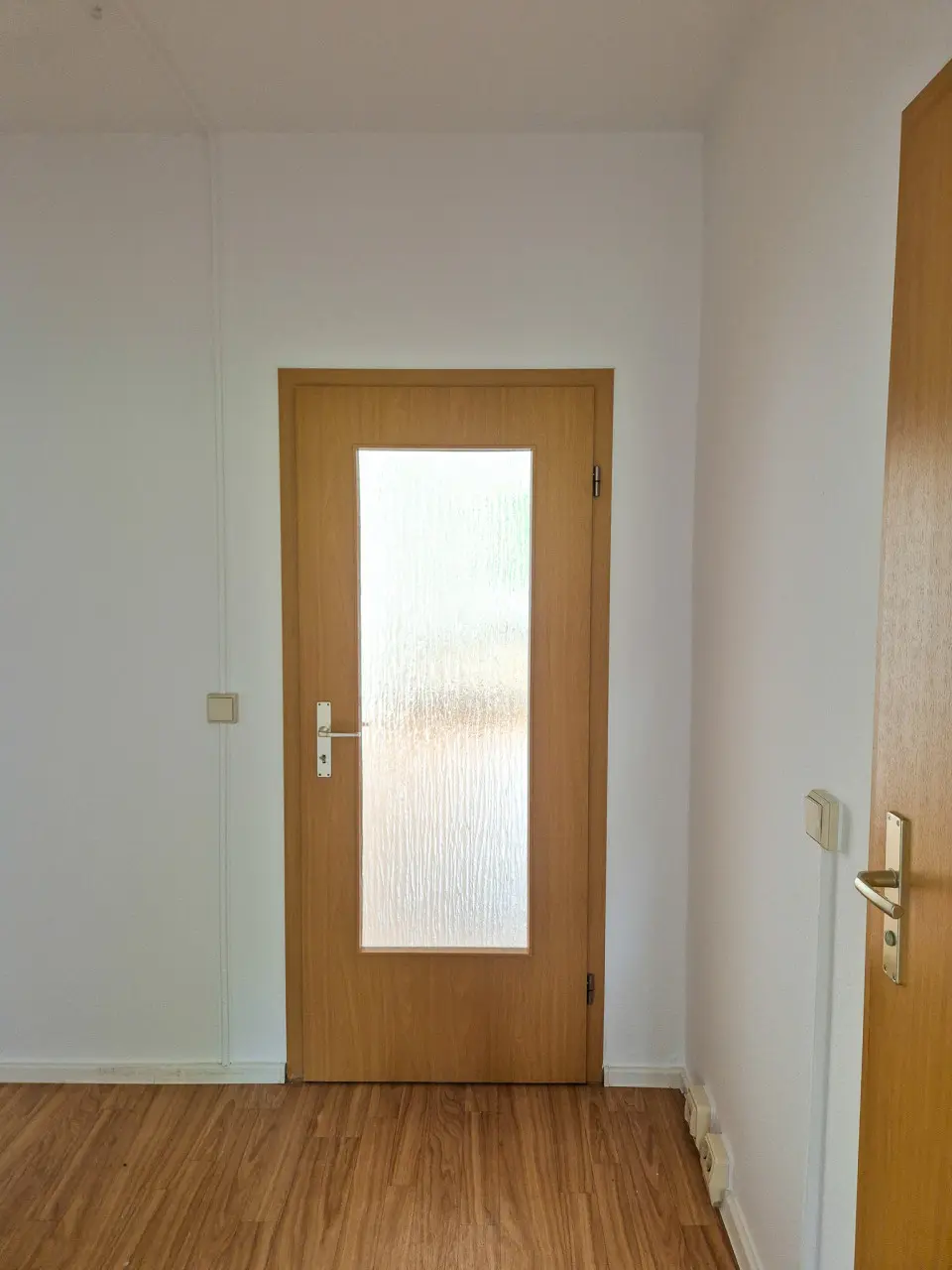 Hallway - 3-room apartment with a remodeled kitchen (with window) and a utility room