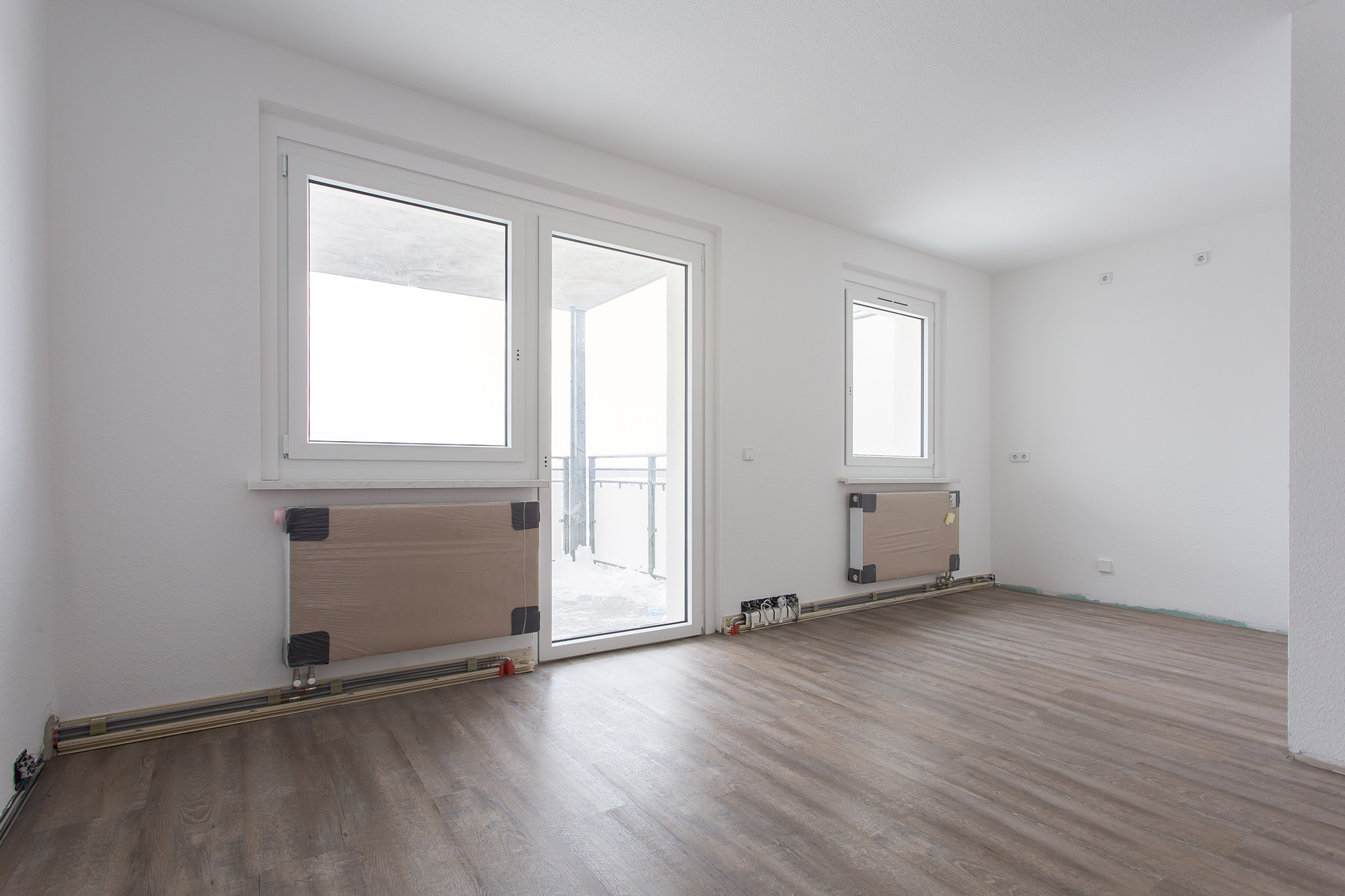 Wohnzimmer - Neubau – Attraktive barrierearme 2-Raum-Wohnung