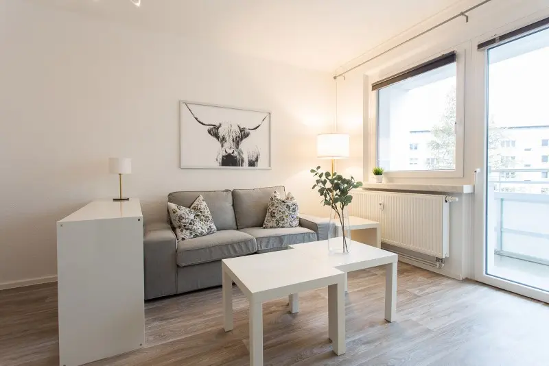 Wohnzimmer - Einziehen und wohlfühlen – hübsch möblierte Wohnung in super Lage