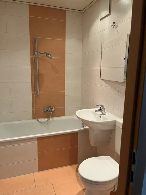 Bathroom with tub - #Small 3-room attic apartment in a green setting#