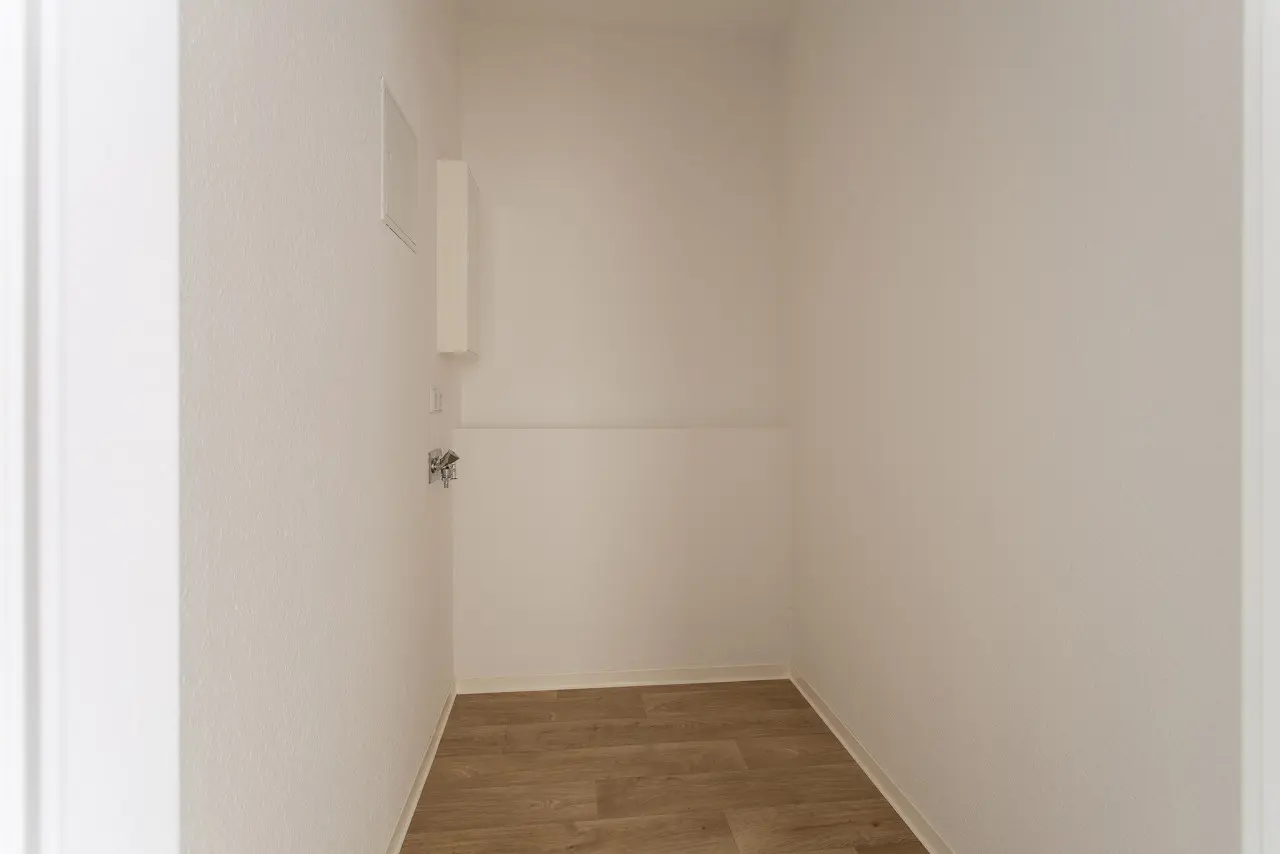 Comparison: Storage Room vs. 2-Bedroom Apartment with Elevator in a Green Setting